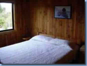 Bedroom of cabin at Antilco, the horse riding ranch in Chile